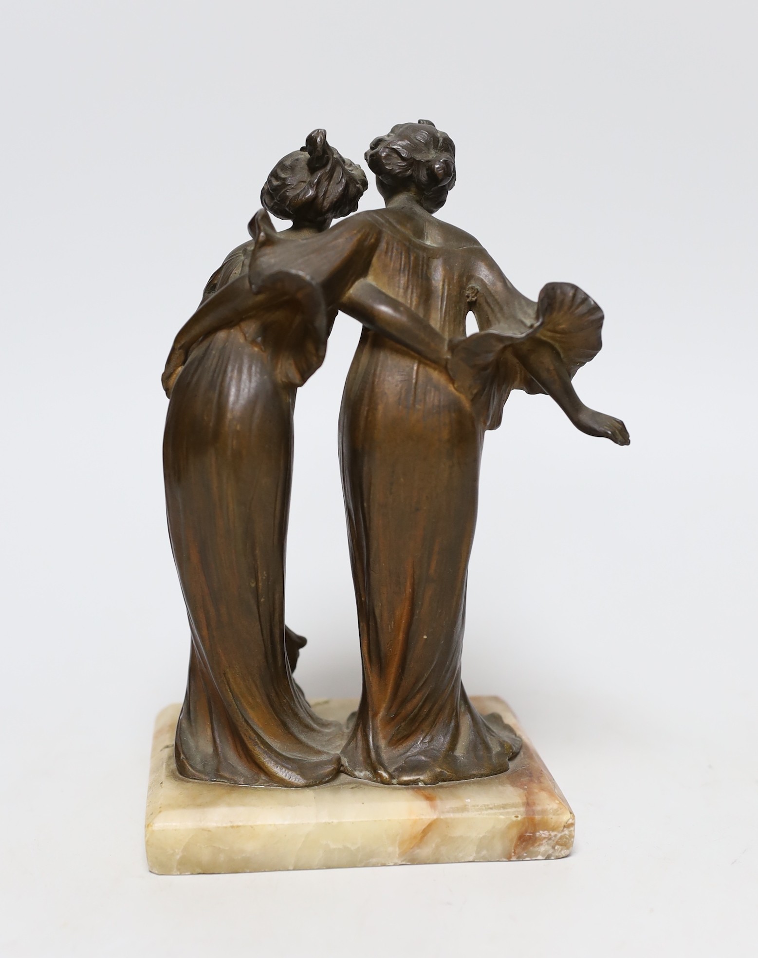 An Art Nouveau spelter figure group on marble base, of two ladies, 19cms high
